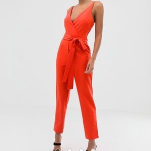 Orange ASOS wrap front jumpsuit